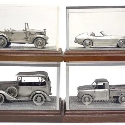 Sale Photo Thumbnail #562: (4) Datsun / Nissan Dealer Award Pewter Car Models