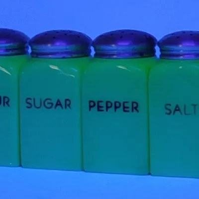 Sale Photo Thumbnail #677: (4) 1930s Jadeite Kitchen Shakers (Uranium Glass)