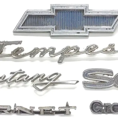 Sale Photo Thumbnail #610: (6) 1960s-70s Car Body Emblems / Badges