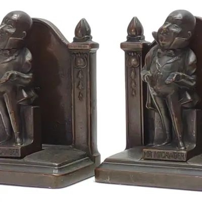 Sale Photo Thumbnail #629: Early 1900s Dickens Mr Micawber Bookends