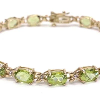 Sale Photo Thumbnail #205: 10K Gold Peridot Tennis Bracelet (7.25" L)