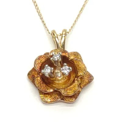 Sale Photo Thumbnail #176: 14K Yellow Gold Diamond Flower Pendant Necklace