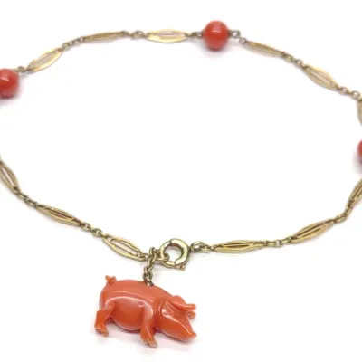 Sale Photo Thumbnail #93: 14K Gold Carved Coral Pig Chain Bracelet (7" L)