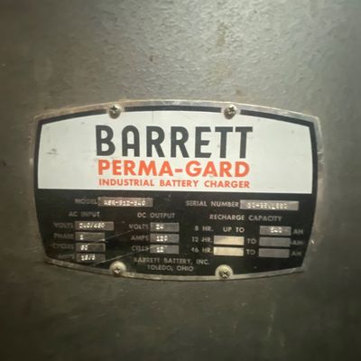 Sale Photo Thumbnail #7: Manufacturer data plate on a vintage Barrett Perma-Gard industrial battery charger, displaying model ASR-612-540 and technical specifications.
