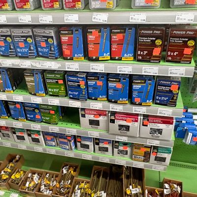 Sale Photo Thumbnail #25: Retail shelving stocked with an extensive assortment of boxed and loose Power Pro screws and fasteners.