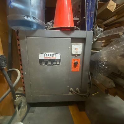 Sale Photo Thumbnail #6: Vintage Barrett Perma-Gard industrial battery charger in a gray metal cabinet, showing moderate wear.