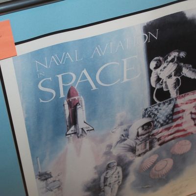 Sale Photo Thumbnail #110: Framed 'Naval Aviation in Space' art print, marked as autographed by nine astronauts with attached documentation.