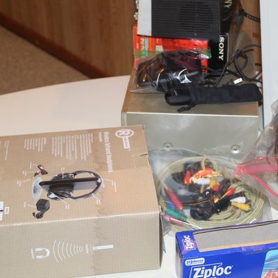 Sale Photo Thumbnail #93: RadioShack wireless infrared headphones in original box, accompanied by various audio/video cables and electronics accessories.