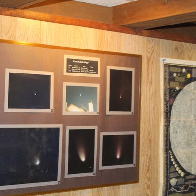 Sale Photo Thumbnail #86: Framed Comet Hale-Bopp photo compilation from 1997 alongside an astronomy map poster.