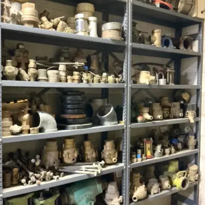 Metal Shelving with Assorted Plumbing Supplies & More