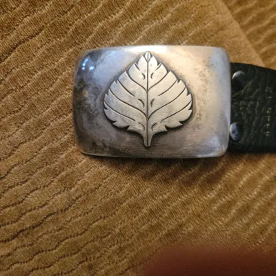 Sale Photo Thumbnail #43: Hayes Aspen belt buckle presented by the city of Aspen for twenty years of work.