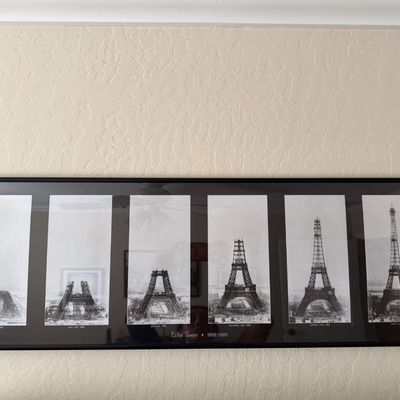 Sale Photo Thumbnail #21: Framed panoramic print depicting the historical stages of the Eiffel Tower's construction from 1888 to 1889.