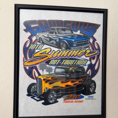 Sale Photo Thumbnail #12: Framed Goodguys 10th Summer Get-Together 2003 promotional poster featuring hot rod and custom truck graphics, displayed in a simple black frame.