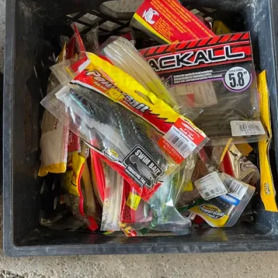 Fishing Tackle – Soft Plastic Lures
A generous assortment of packaged fishing tackle, including soft plastic swim baits, worms, and other...