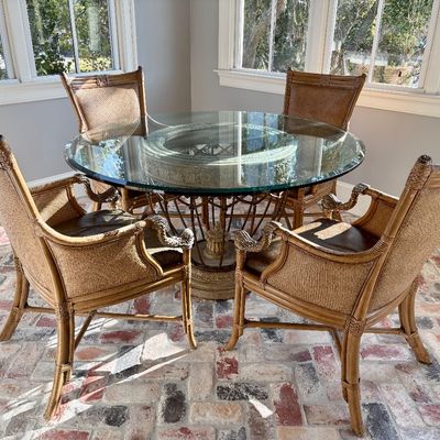 Sale Photo Thumbnail #22: Hooker caste iron and beveled glass top table
$350
54X30"
Hooker set of 4 bamboo and leather armchairs with silver tone dolphins $499
table and chairs $799