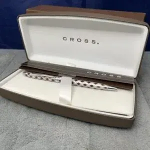 Cross silver-tone patterned ballpoint pen, presented in its original hard clamshell case.