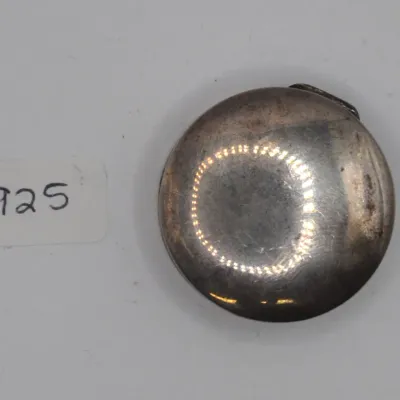Sale Photo Thumbnail #50: Round sterling silver  stamped with a 925 mark, featuring a smooth tarnished finish and a top hinge.