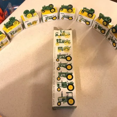2 Vintage John Deere Miniature Toy Tractor Sets (8 Tractors Per Set w/ Original Boxes)