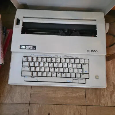 Sale Photo Thumbnail #31: Vintage Smith Corona Electric Typewriter