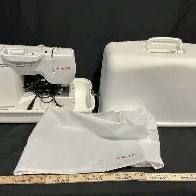 Singer Stylist Computerized Sewing Machine With A Hard Carrying Case And A Foot Pedal