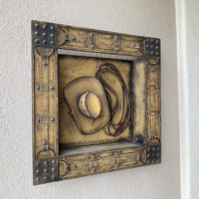Sale Photo Thumbnail #15: Rustic Western-style framed 3D shadow box metal wall art featuring a cowboy hat and lasso.