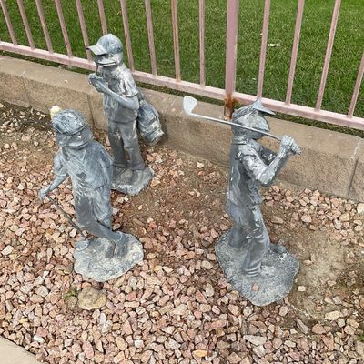 Sale Photo Thumbnail #32: Trio of whimsical metal frog golfer statues, featuring figures posing with golf clubs and bags.