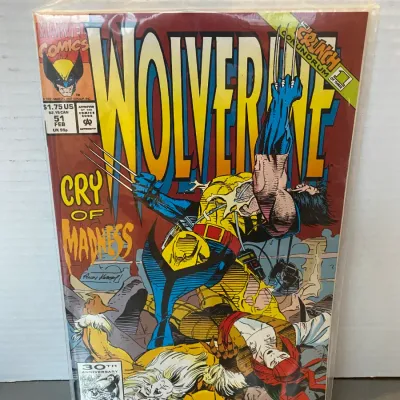 Sale Photo Thumbnail #91: Marvel Comics Wolverine issue #51, published February 1992, featuring cover art by Andy Kubert and stored in a protective plastic sleeve.