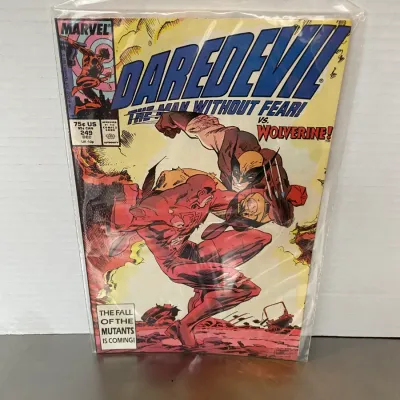 Sale Photo Thumbnail #21: Marvel Comics Daredevil #249 featuring Wolverine, published December 1987, stored in a protective plastic sleeve.