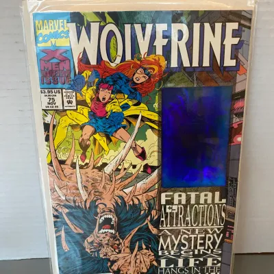 Sale Photo Thumbnail #98: Marvel Comics Wolverine issue #75 from November 1993, featuring a hologram cover and bagged with a backing board.