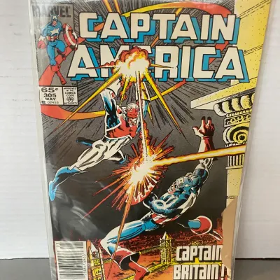 Sale Photo Thumbnail #68: Marvel Comics Captain America #305 comic book, May 1985, featuring Captain Britain in a bagged and boarded protective sleeve.