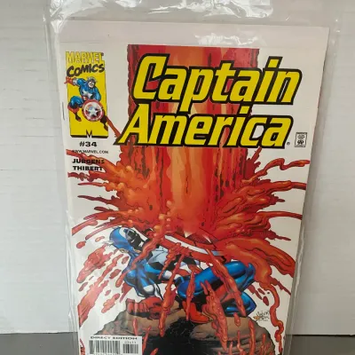 Sale Photo Thumbnail #77: Marvel Comics Captain America #34, direct edition, bagged and boarded in collectible condition.