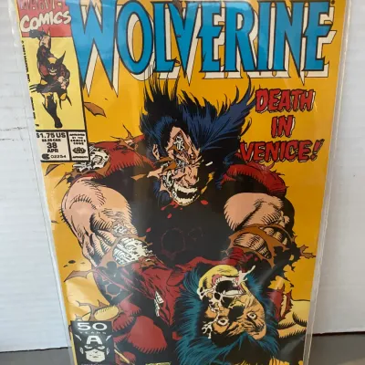 Sale Photo Thumbnail #87: Marvel Comics Wolverine #38, published April 1991, featured in a protective sleeve with cover art by Marc Silvestri and Dan Green.