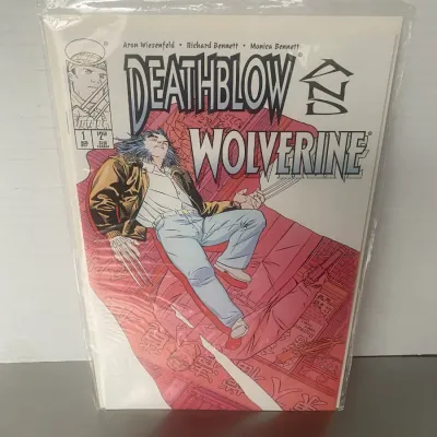 Sale Photo Thumbnail #106: Image Comics Deathblow and Wolverine issue #1 comic book, published September 1996, sealed in a protective plastic sleeve with backing board.