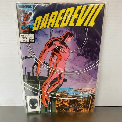 Sale Photo Thumbnail #22: Marvel Comics Daredevil #241, published April 1987, stored in a protective plastic sleeve with backing board.