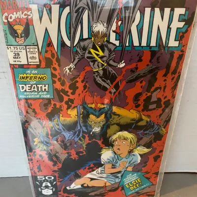 Sale Photo Thumbnail #88: Marvel Comics Wolverine #39, published May 1991, featuring Storm and Elsie Dee on the cover, bagged for protection.
