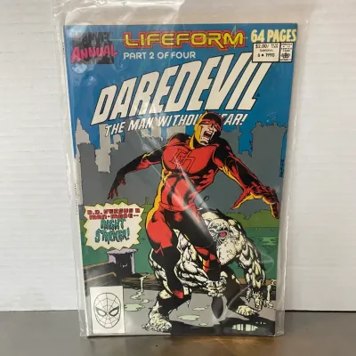 Sale Photo Thumbnail #5: Marvel Comics Daredevil Annual #6 comic book from 1990, featuring Lifeform Part 2, sealed in a protective plastic sleeve.