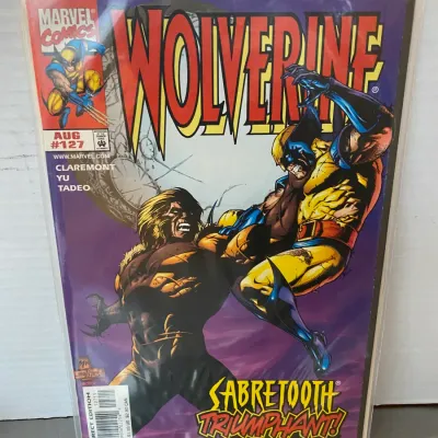 Sale Photo Thumbnail #82: Marvel Comics Wolverine #127, published in August 1998, featuring Sabretooth on the cover and protected in a plastic sleeve with a backing board.