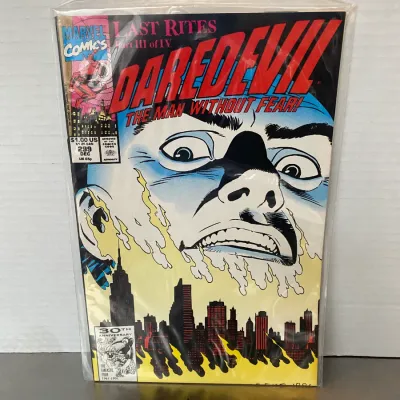 Sale Photo Thumbnail #17: Marvel Comics Daredevil #299, December 1991, featuring 'Last Rites Part III of IV'. The comic is bagged and boarded in well-preserved condition.
