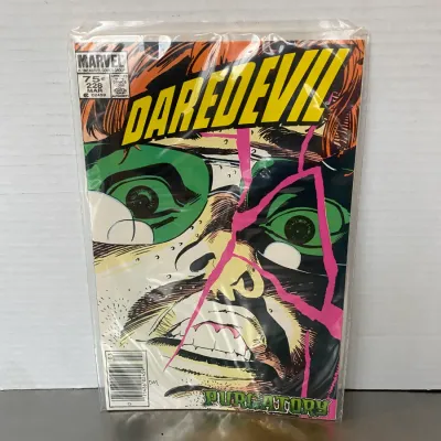 Sale Photo Thumbnail #8: Bagged and boarded copy of Marvel Comics' Daredevil #228, published in March 1986, featuring art by David Mazzucchelli.