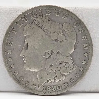 Sale Photo Thumbnail #40: 59 1880 morgan silver dollar