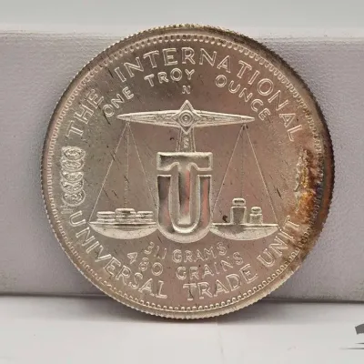 Sale Photo Thumbnail #23: 42 1973 international universal trade unit 1oz silver round