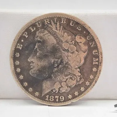 Sale Photo Thumbnail #39: 58 1879 s morgan silver dollar