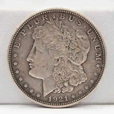 Sale Photo Thumbnail #36: 55 1921 morgan silver dollar