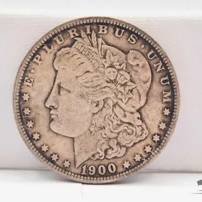 Sale Photo Thumbnail #41: 60 1900 morgan silver dollar