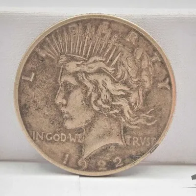 Sale Photo Thumbnail #45: 64 1922 silver peace dollar