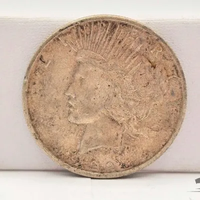 Sale Photo Thumbnail #46: 65 1922 s silver peace dollar