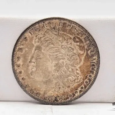 Sale Photo Thumbnail #33: 52 1885 s morgan silver dollar