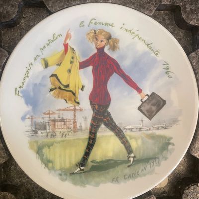 Sale Photo Thumbnail #5: Vintage porcelain decorative plate titled 'Françoise en pantalon, la Femme indépendante 1960', featuring artwork signed Fr. Ganeau and dated 1979.