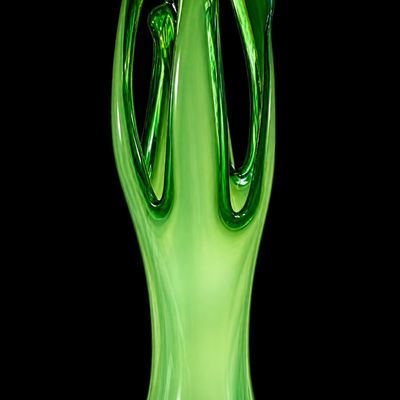 Sale Photo Thumbnail #11: Mid-century modern hand-blown green art glass vase featuring dramatic pulled, abstract tendrils and an opaque white interior layer.