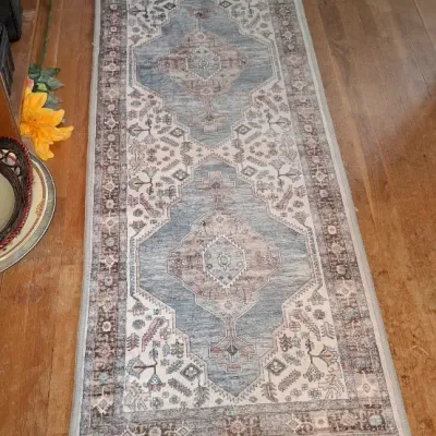 Sale Photo Thumbnail #278: Contemporary runner rug featuring a faded Persian-style geometric medallion pattern in shades of blue, beige, and muted pink.